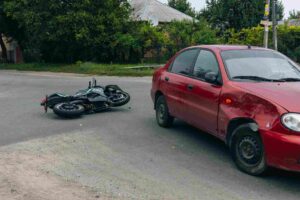 Motorcycle accident on road.