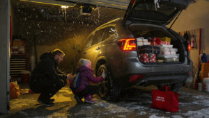 a cinematic warm toned shot inside a well lit Holiday Road Trip